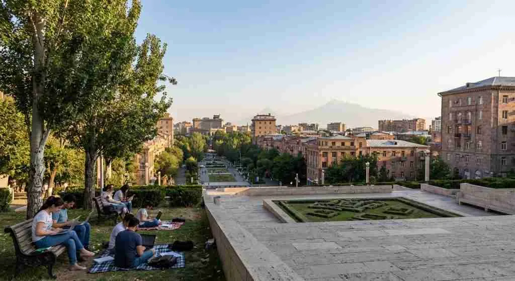 A view of Yerevan's Cascade with people working outdoors on laptops.