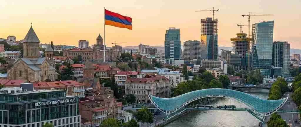 A skyline of a European city featuring modern and historical architecture.