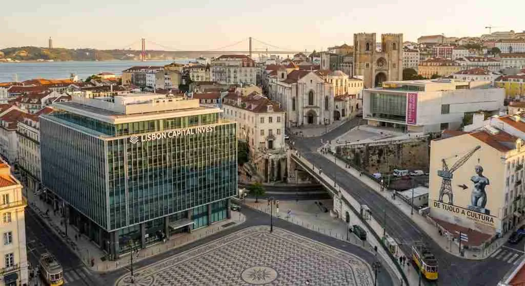 A vibrant cityscape of Portugal showing investment offices and cultural landmarks.
